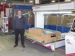 Evan Gilham with a Thermwood CNC machine Evan Gilham with a Thermwood CNC machine