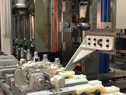 The L42X all-electric reheat stretch blow molding system/W. Amsler Equipment Inc. The L42X all-electric reheat stretch blow molding system/W. Amsler Equipment Inc.