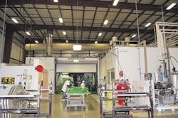 The KraussMaffei-manufactured double-shuttle mold carrier system/PMM