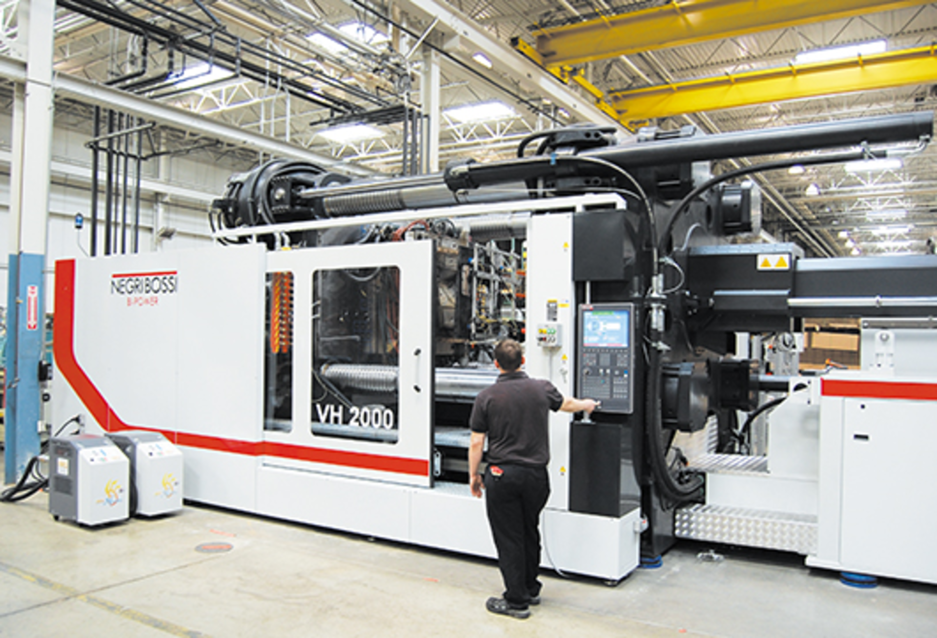 Ferriot Inc.&acirc;&euro;&trade;s huge 2,250-ton Negri Bossi Bi-Power injection molding machine/PMM