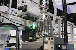 Sumitomo's fully automatic color-change system reduces the time and labor required to change the color of a molded part./Sumitomo (SHI) Demag Plastics Machinery North America Inc. Sumitomo's fully automatic color-change system reduces the time and labor required to change the color of a molded part./Sumitomo (SHI) Demag Plastics Machinery North America Inc.