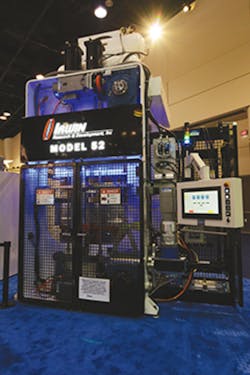 The Model 52 thermoformer on display held a 0.002-inch tolerance between the top and bottom platens while running with 180 tons of clamping force./PMM The Model 52 thermoformer on display held a 0.002-inch tolerance between the top and bottom platens while running with 180 tons of clamping force./PMM