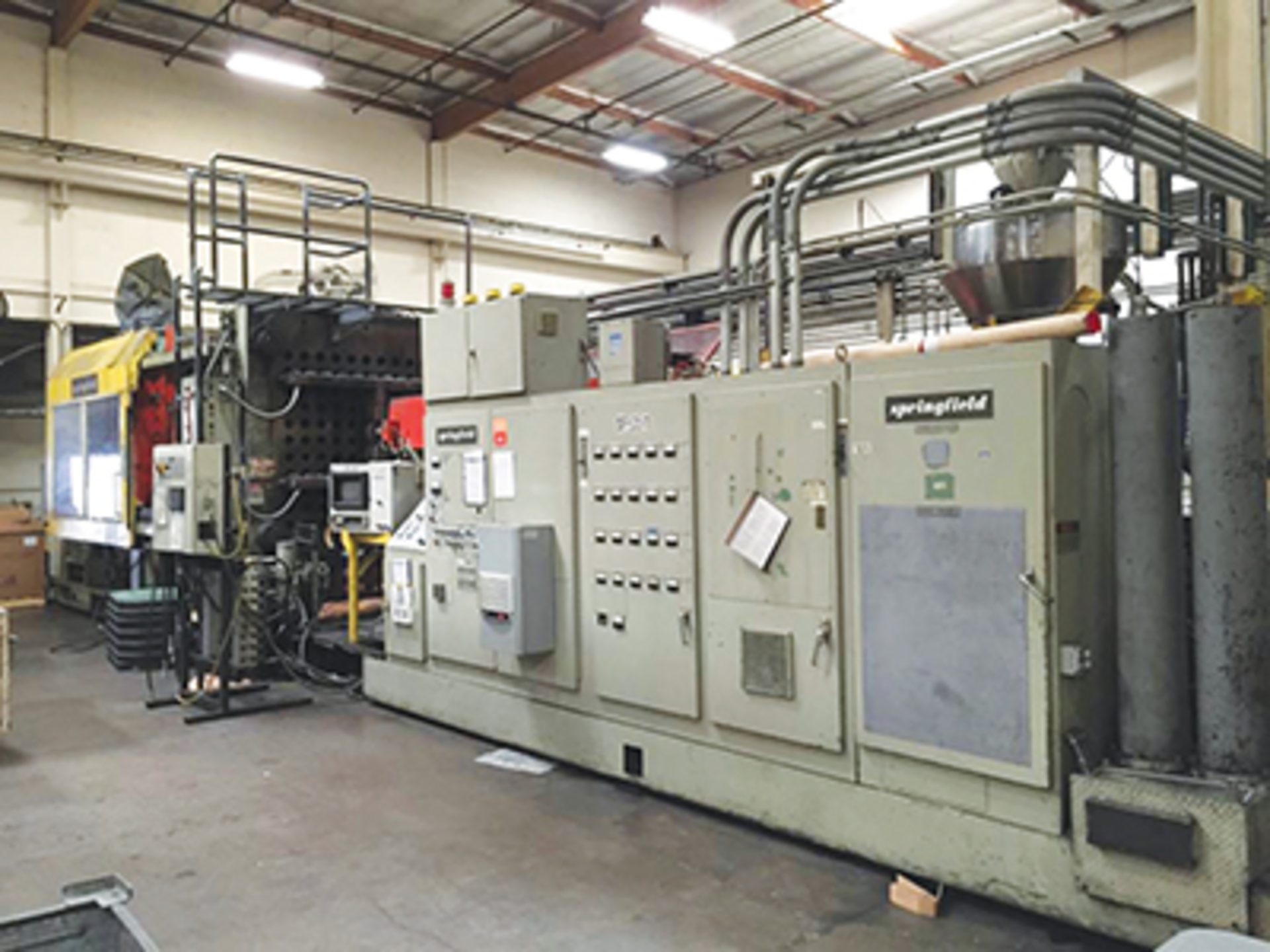 A 400-ton LPIM machine before remanufacture/Milacron LLC