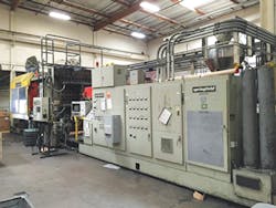 A 400-ton LPIM machine before remanufacture/Milacron LLC A 400-ton LPIM machine before remanufacture/Milacron LLC