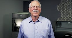 Chuck Hull stands in front of a ProJet MJP 3600 and ProJet CJP 460Plus â part of the company's broad plastics 3-D printing portfolio. Inset: An eye wash cup, the first 3-D printed part ever produced, was created by Hull in 1983 on an SLA-1 3-D printer./3D Systems Chuck Hull stands in front of a ProJet MJP 3600 and ProJet CJP 460Plus â part of the company's broad plastics 3-D printing portfolio. Inset: An eye wash cup, the first 3-D printed part ever produced, was created by Hull in 1983 on an SLA-1 3-D printer./3D Systems