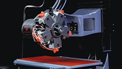 The systems' rotating extruder heads pull filament from a reel and push it into a heated cavity and through a small nozzle opening./Diabase Engineering LLC The systems' rotating extruder heads pull filament from a reel and push it into a heated cavity and through a small nozzle opening./Diabase Engineering LLC