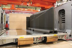 A VLP part rides on Teflon-coated stainless-steel belts./Thermwood Corp. A VLP part rides on Teflon-coated stainless-steel belts./Thermwood Corp.