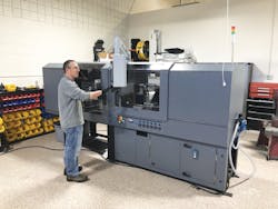 Extrude To Fill’s E120H horizontal clamp machine Extrude To Fill’s E120H horizontal clamp machine