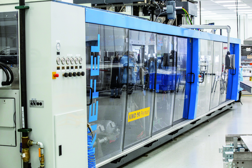 A Kiefel KMD 90 pressure former