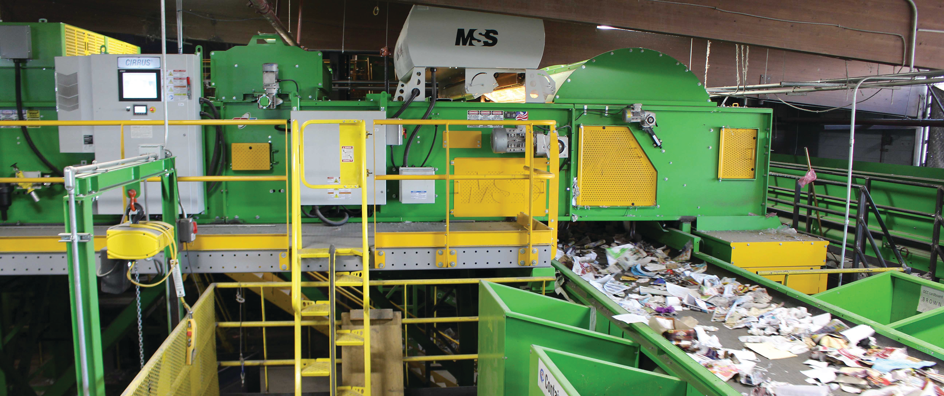 The PrecisionFlow ejection hood, shown at the top right, uses airflow to separate recyclable items, such as plastic bags, from the waste stream.