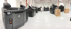 Jabil’s stable of HP Multi Jet Fusion printers. Jabil’s stable of HP Multi Jet Fusion printers.