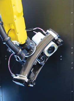 Hexagon Aicon 3-D scanners mounted on a robot arm in the PartInspect L generate fast, accurate digital data on component measurements.