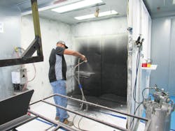 A manual spray-painting operation is part of a 10-booth clean-room system at Mack Molding’s Statesville, N.C., facility. A manual spray-painting operation is part of a 10-booth clean-room system at Mack Molding’s Statesville, N.C., facility.