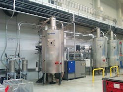 A drying system from Labotek includes an external heat recovery (EHR) unit, drying hopper, desiccant flexible dryer, vacuum receivers and a vacuum station and filter. A drying system from Labotek includes an external heat recovery (EHR) unit, drying hopper, desiccant flexible dryer, vacuum receivers and a vacuum station and filter.