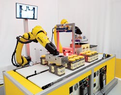 An M-20iD/25 robot demonstrates its case-packing abilities. An M-20iD/25 robot demonstrates its case-packing abilities.