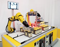 An M-20iD/25 robot demonstrates its case-packing abilities. An M-20iD/25 robot demonstrates its case-packing abilities.
