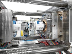 The new GX 1100 from KraussMaffei produces 20-liter buckets with in-mold labeling. The new GX 1100 from KraussMaffei produces 20-liter buckets with in-mold labeling.