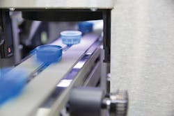 The El-Exis SP producing water bottle caps The El-Exis SP producing water bottle caps