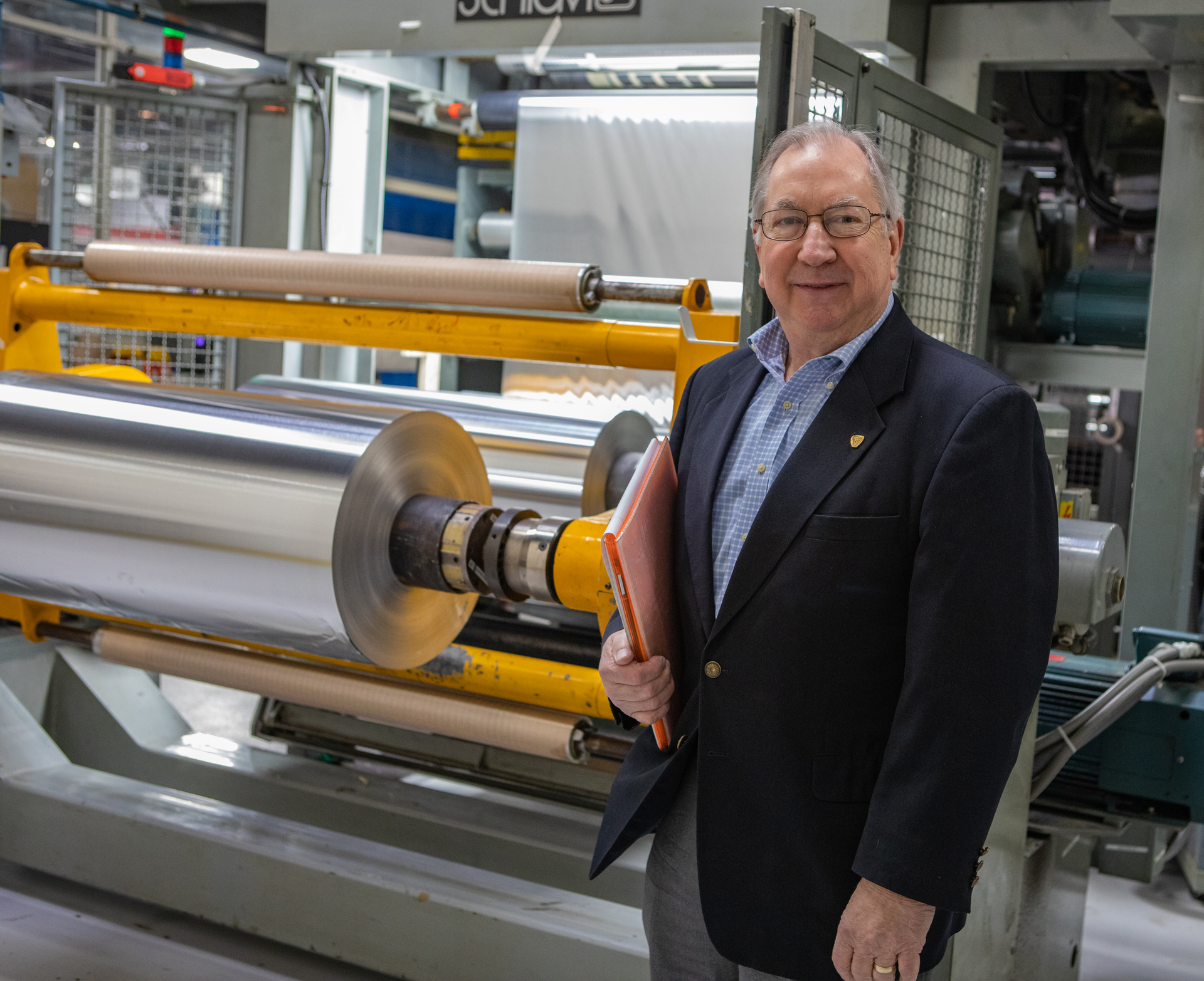 Len Czuba with a roll stack system.