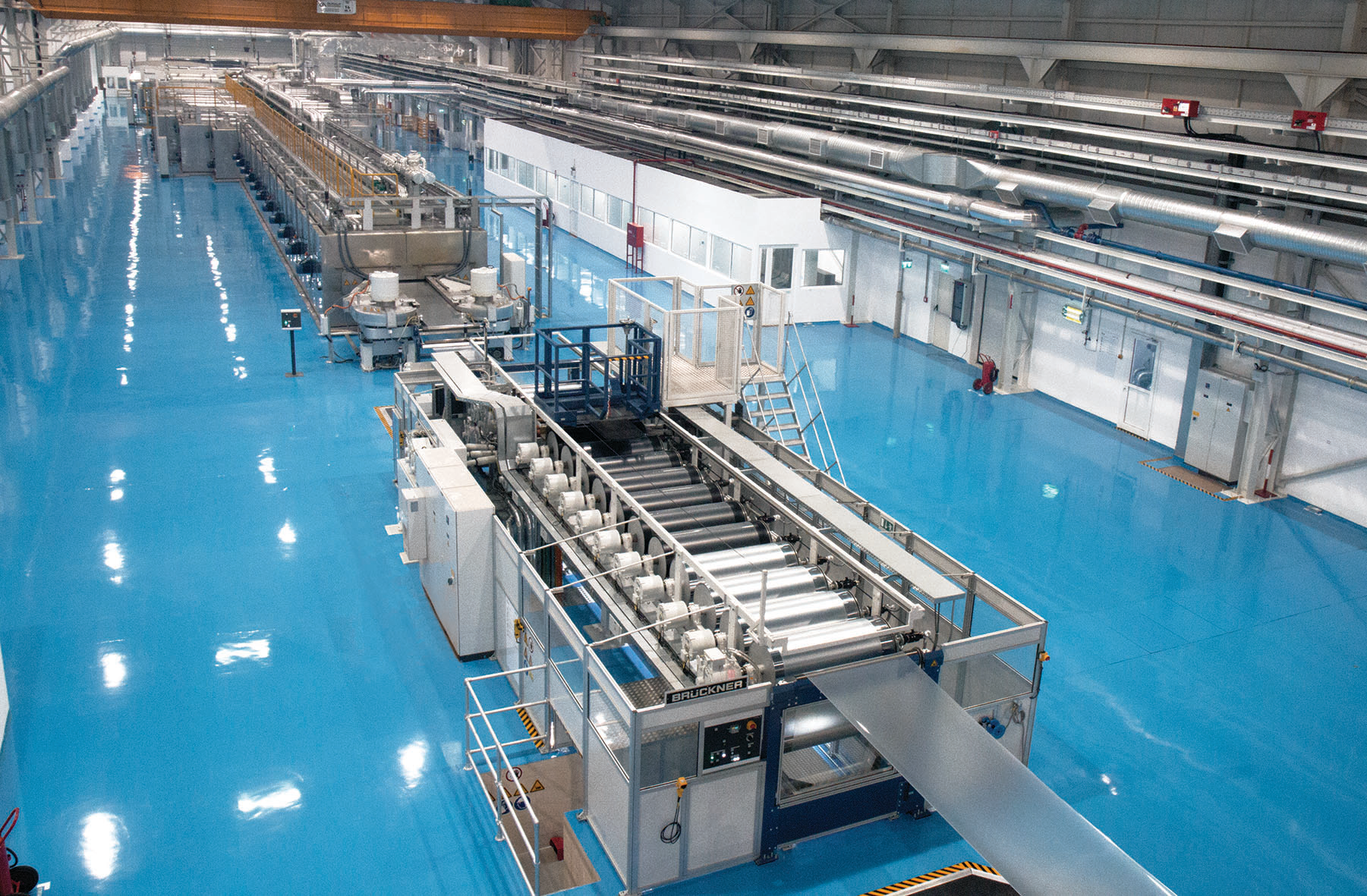 Br&uuml;ckner is adding to its portfolio of film-extrusion lines, like these shown, with a new system that can produce biaxially oriented PE and PP films.