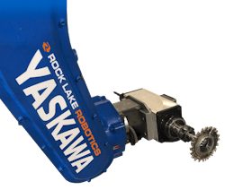 The six-axis Yaskawa robot can get around the entire part and trim it in one setup.
