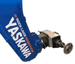 The six-axis Yaskawa robot can get around the entire part and trim it in one setup. The six-axis Yaskawa robot can get around the entire part and trim it in one setup.