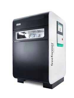 Arburg showed a prototype of its Freeformer 300-4X, which can produce continuous-fiber-reinforced parts due to its four-axis part carrier and fiber-feeding unit, at the K show Arburg showed a prototype of its Freeformer 300-4X, which can produce continuous-fiber-reinforced parts due to its four-axis part carrier and fiber-feeding unit, at the K show