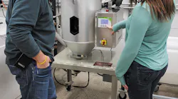 Matrix Tool GM Dave Moyak and engineer Savannah Custard check settings on one of the company’s 20 Conair MicroWheel dryers.