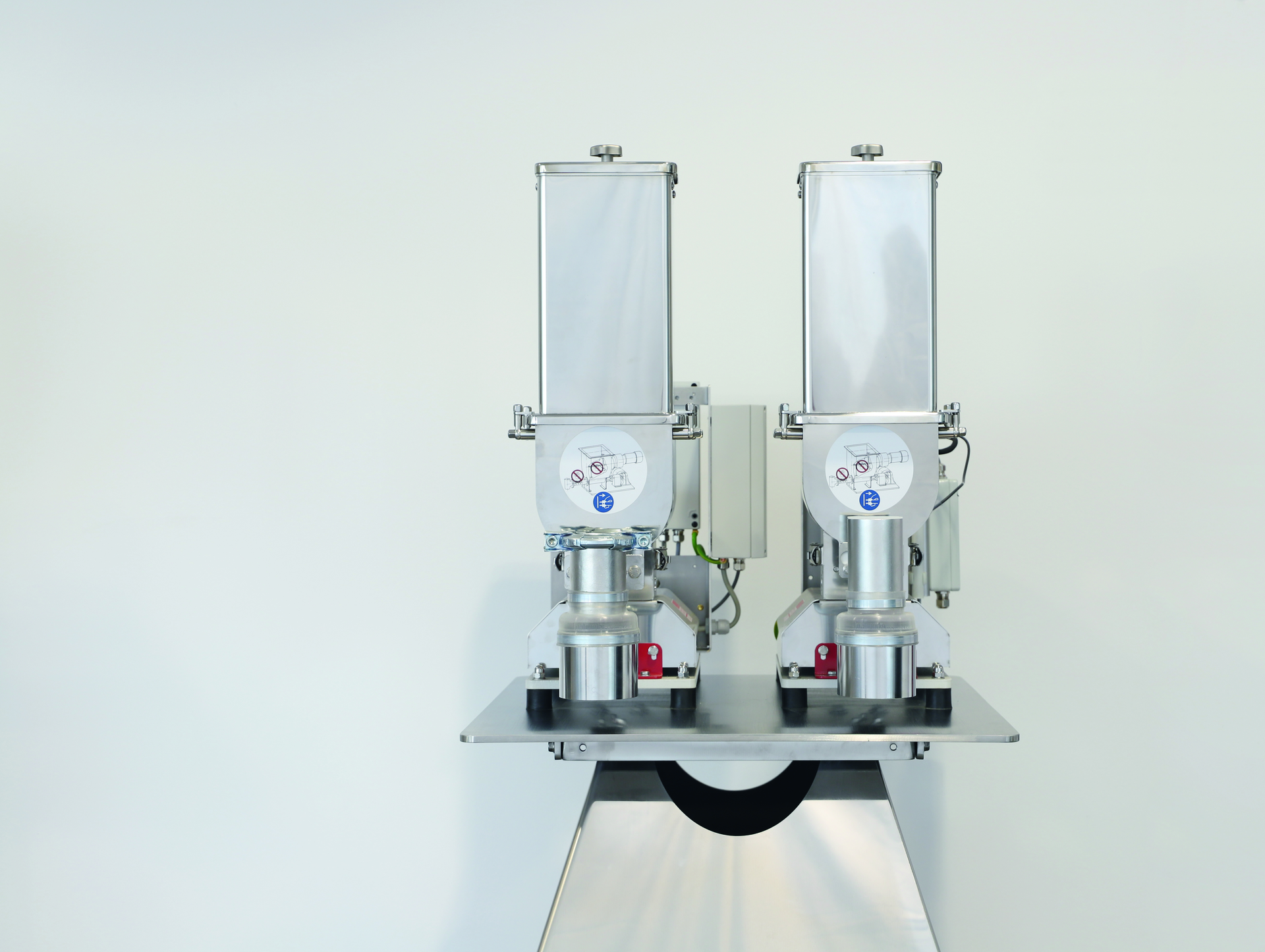 Brabender Technologie's DDSR20 twin-screw feeder, left, and DSR28 loss-in-weight feeder now feature major design revisions.