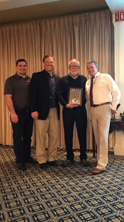 From left to right: David Sharp, IMM operations manager; Sonny Morneault, sales VP; Tom Betts; and David Preusse, president From left to right: David Sharp, IMM operations manager; Sonny Morneault, sales VP; Tom Betts; and David Preusse, president