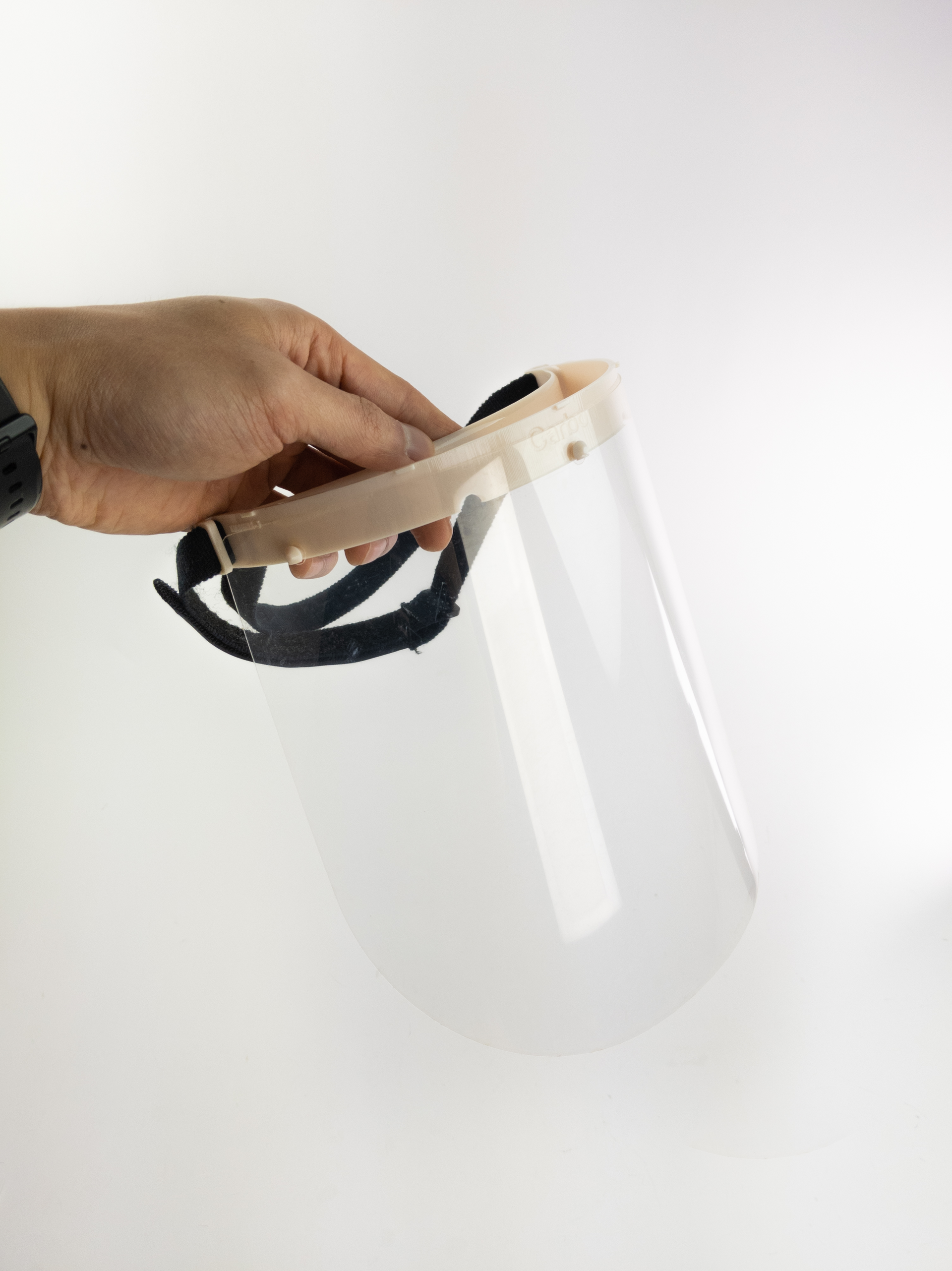 Using its printers, Carbon is making face shields for use by health-care professionals.