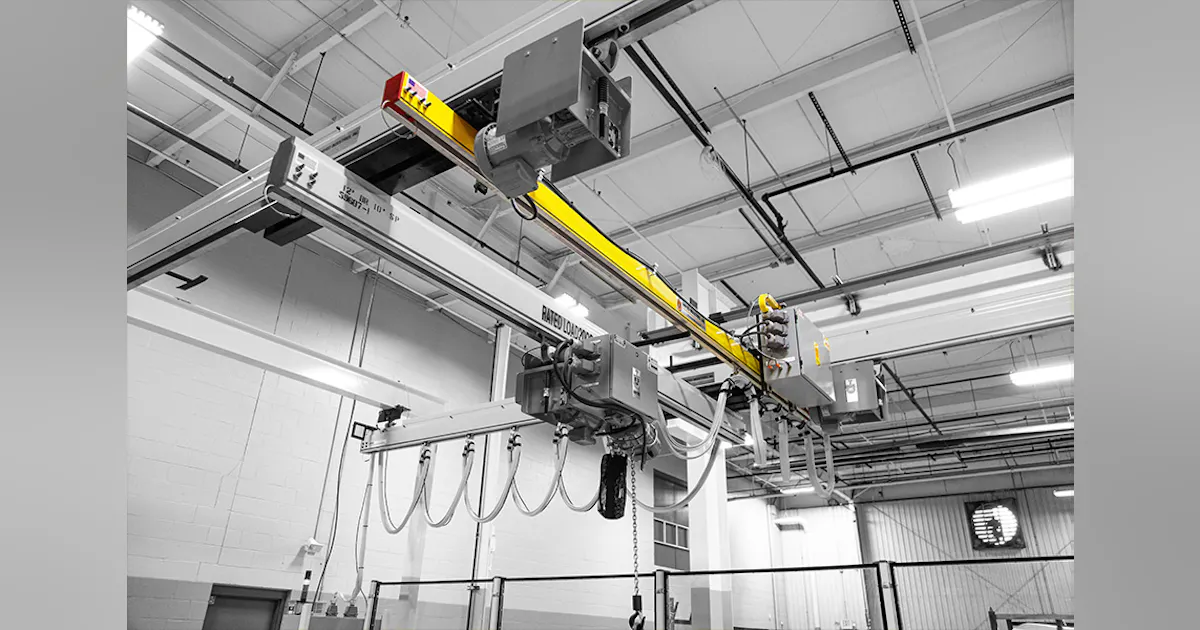 Overhead Rails Extendable Overhead rails carry lifting machinery | Plastics Machinery Manufacturing