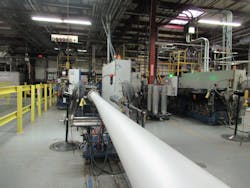 PS foam exiting a tandem extruder PS foam exiting a tandem extruder