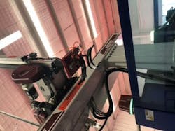 A Wittmann Battenfeld robot starts its approach into the mold area while the mold is opening using SmartRemoval technology. A Wittmann Battenfeld robot starts its approach into the mold area while the mold is opening using SmartRemoval technology.