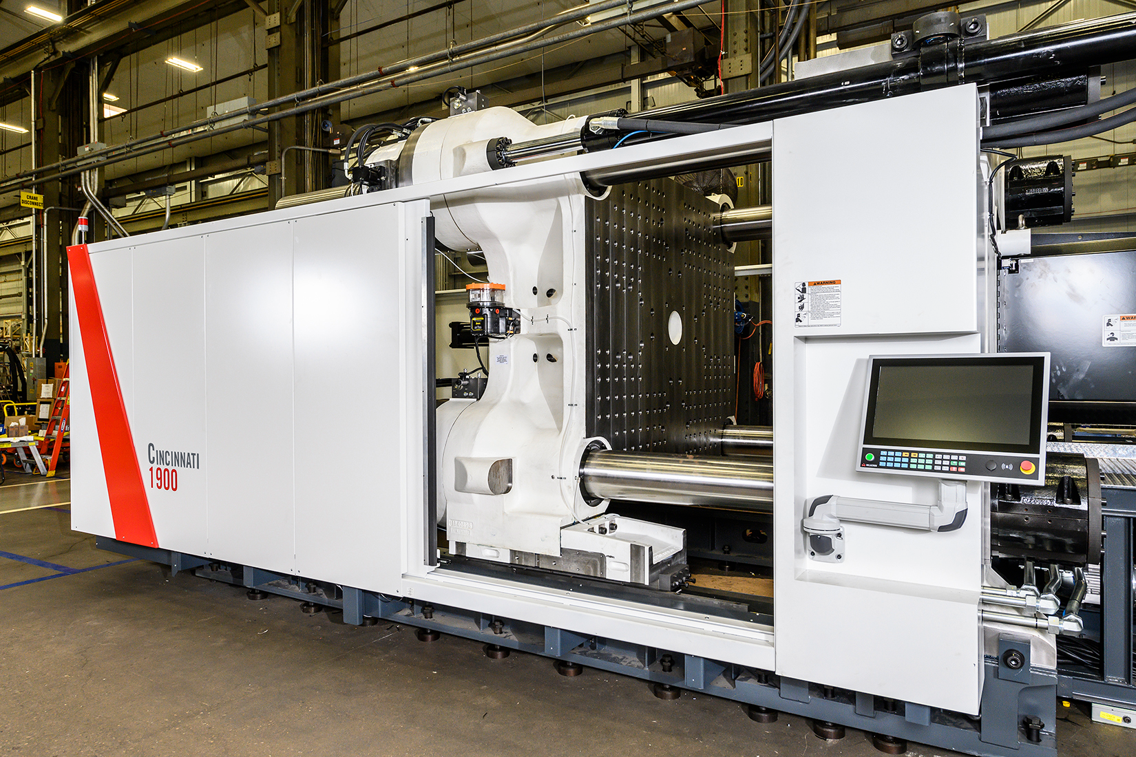 Milacron's portfolio of presses includes this Cincinnati 1900.