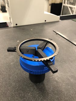 Eaton Vehicle Group used a fused-deposition modeling 3-D printer to create this fixture. It is used to hold parts for quality inspections. Eaton Vehicle Group used a fused-deposition modeling 3-D printer to create this fixture. It is used to hold parts for quality inspections.