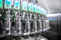 Sidel's Super Combi Compact system can produce, fill and cap as many as 54,000 half-liter water bottles an hour. Sidel's Super Combi Compact system can produce, fill and cap as many as 54,000 half-liter water bottles an hour.