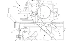 Bay Plastics Machinery's pelletizer has a divider plate separating two chute sections.