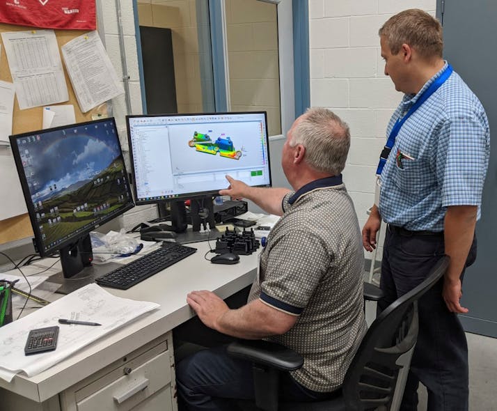 Ferriot quality supervisor George Popov and quality technician Walt Kravetz review SmartScan data in PolyWorks Inspector software.