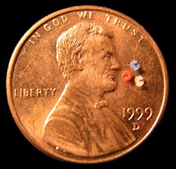 Makuta specializes in manufacturing micro parts, like the components on this penny. The smallest part the company has produced was a polyoxymethylene bobbin used in miniature electrical devices. It weighed 0.0003 gram and measured 1.11mm by 0.96mm by 0.64mm. Makuta specializes in manufacturing micro parts, like the components on this penny. The smallest part the company has produced was a polyoxymethylene bobbin used in miniature electrical devices. It weighed 0.0003 gram and measured 1.11mm by 0.96mm by 0.64mm.