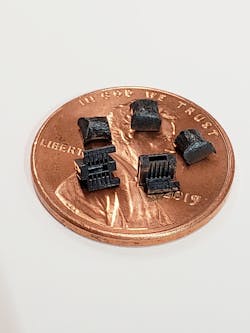 Matrix specializes in molding small parts, like these components. As an example, it recently completed a mold that used one pellet to produce 11 parts, each weighing 0.002 gram. In addition, it has molded parts with wall thicknesses as thin as 0.0029 inch and with a gate as small as 0.0037 inch in diameter. Matrix specializes in molding small parts, like these components. As an example, it recently completed a mold that used one pellet to produce 11 parts, each weighing 0.002 gram. In addition, it has molded parts with wall thicknesses as thin as 0.0029 inch and with a gate as small as 0.0037 inch in diameter.