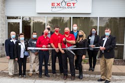 Exact Metrology personnel at the ribbon cutting ceremony in the front row were, from left to right: Dean Solberg, Patrick Wigans and Joe Wright. Members of the Quad Cities Chamber also attended. Exact Metrology personnel at the ribbon cutting ceremony in the front row were, from left to right: Dean Solberg, Patrick Wigans and Joe Wright. Members of the Quad Cities Chamber also attended.