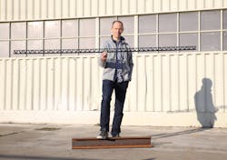 Arris Composites CEO Ethan Escowitz displays a truss made using his company's technology. Arris Composites CEO Ethan Escowitz displays a truss made using his company's technology.