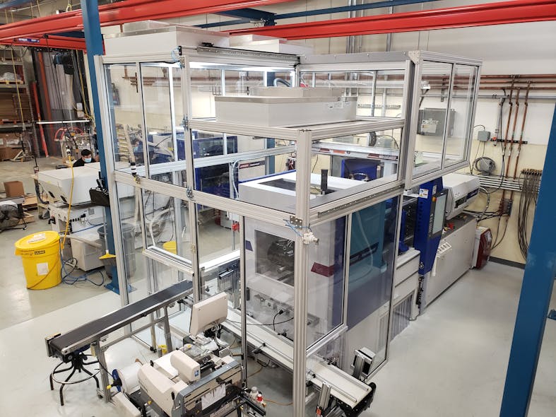 One of PTA Plastics&apos; new presses is a Wittmann Battenfeld EcoPower press with a fully self-contained Class 7 clean room.