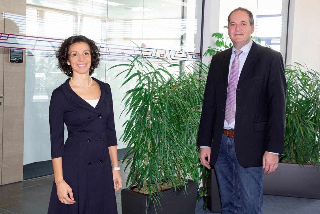 Valentina Faloci, head of sales at Wittmann Battenfeld, left, and Wolfgang Roth, head of application engineering at the company, are directing their departments to collaborate more closely.
