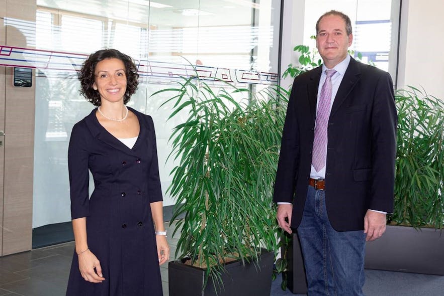 Valentina Faloci, head of sales at Wittmann Battenfeld, left, and Wolfgang Roth, head of application engineering at the company, are directing their departments to collaborate more closely.