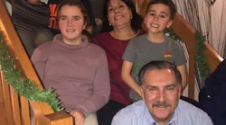 Steve Petrakis, who is retiring in June, enjoys spending time with his family, fishing and boating on a lake outside his home. Shown on the row above him at Christmas 2019 are his grandchildren, Emma and Camden; his wife, Jane; and from left to right, on the top row, grandsons, Nathan and Lincoln.