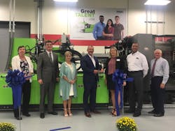 A ribbon cutting event held Oct. 1, 2020, marked the start of the injection molding program at Spartanburg Community College. The program was made possible through a collaboration with Engel, which donated 550-ton duo two-platen hydraulic injection molding machine. A ribbon cutting event held Oct. 1, 2020, marked the start of the injection molding program at Spartanburg Community College. The program was made possible through a collaboration with Engel, which donated 550-ton duo two-platen hydraulic injection molding machine.