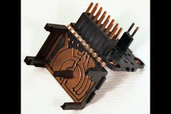 Molder Acromatic Plastics makes a variety of parts for the automotive industry, including contact units like this one. Molder Acromatic Plastics makes a variety of parts for the automotive industry, including contact units like this one.