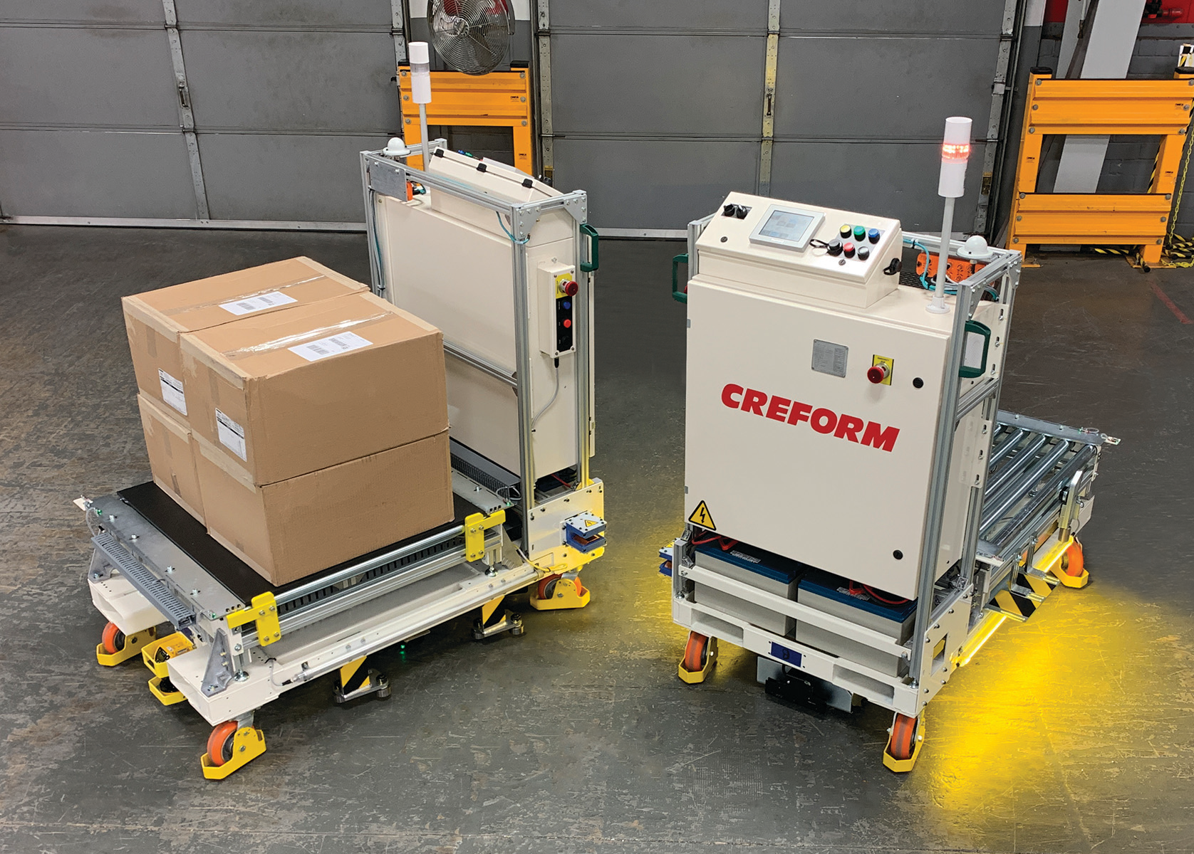 Creform's latest automated guided vehicle has a conveyor deck and can transfer loads between production-floor conveyors.